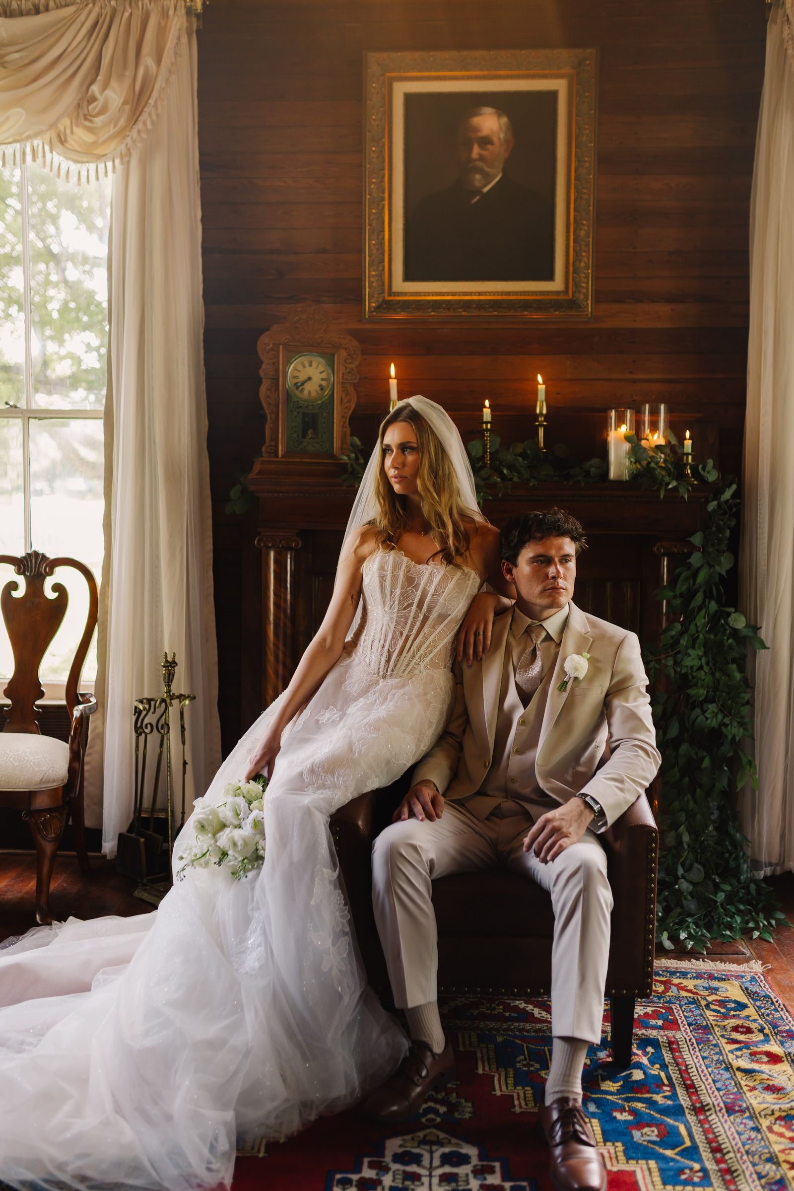 A couple by the parlour fireplace